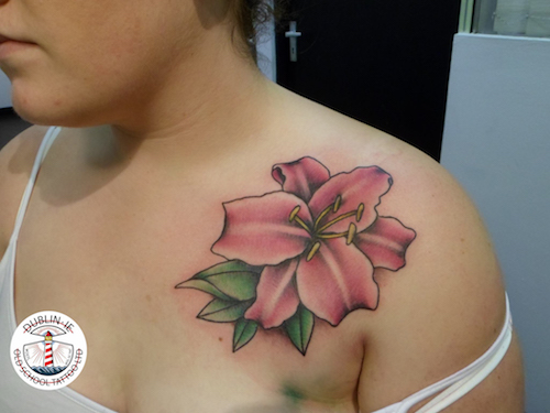 flower on shoulder tattoo
